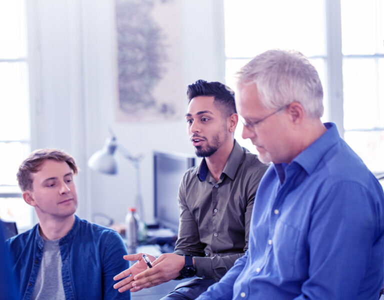 men talking about apprenticeship learner growth data