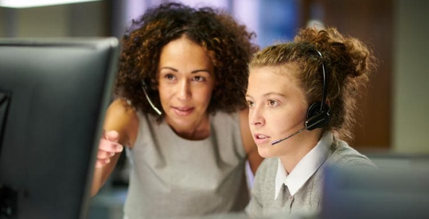 a female call centre worker trains an intern