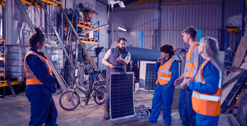 solar panel trainees gaining practical skills
