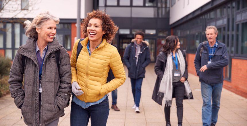 People walking and discussing FE White Paper 2021